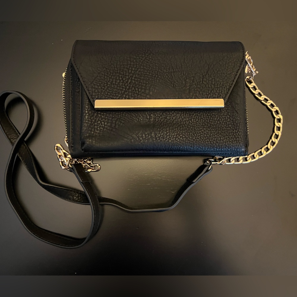 Madison West crossbody/wristlet clutch black purse